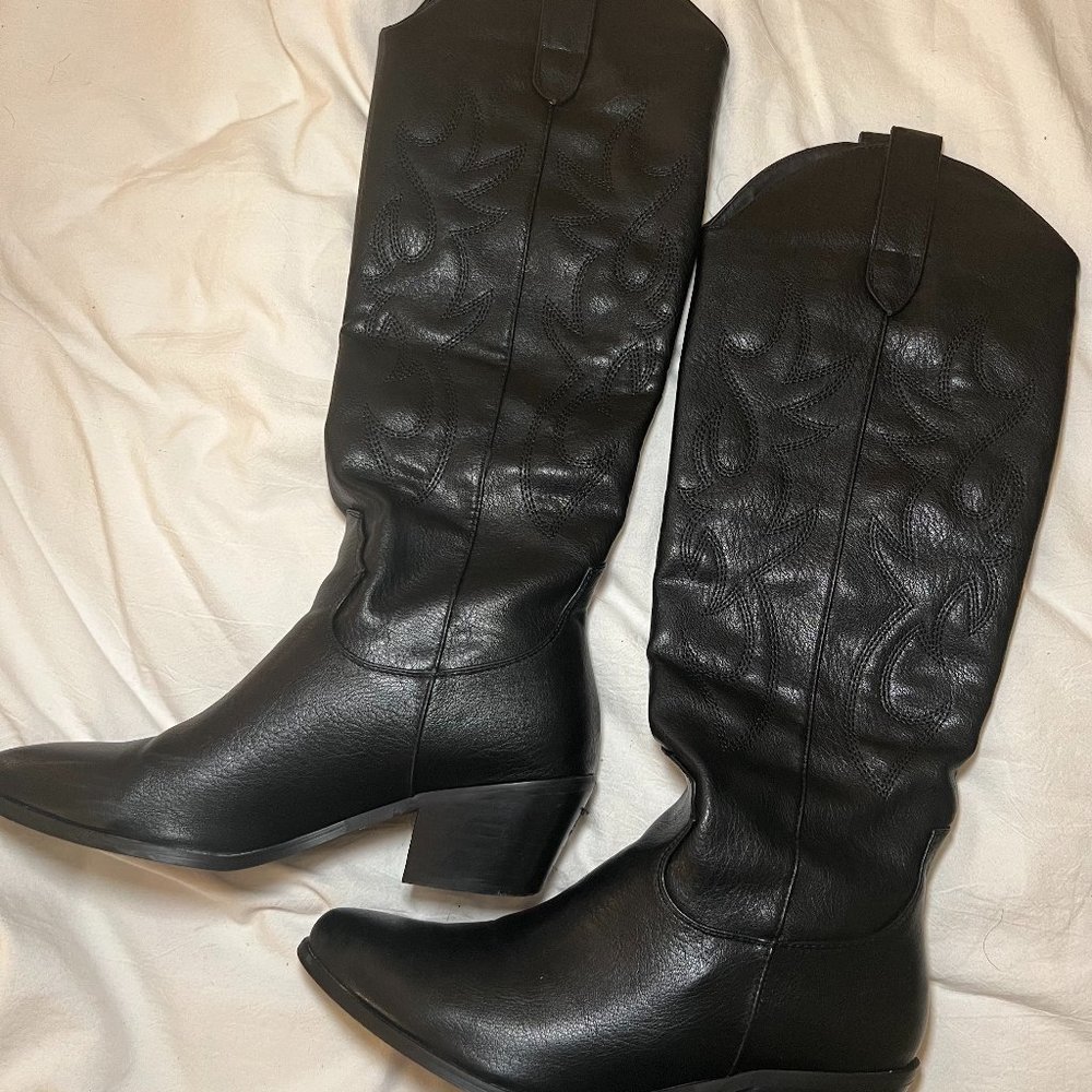 Black leather knee high cowboy boots
